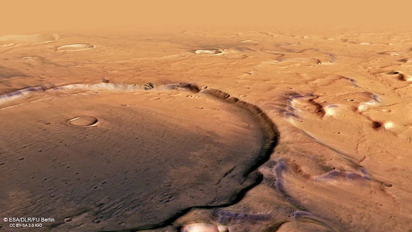 A small impact crater sits inside larger crater in Terra Cimmeria.