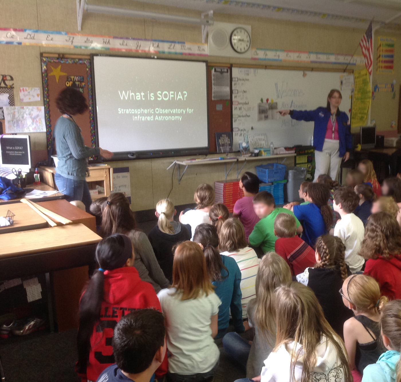 AAA teachers Kim Abegglen and Anna-Melissa Lyons with students