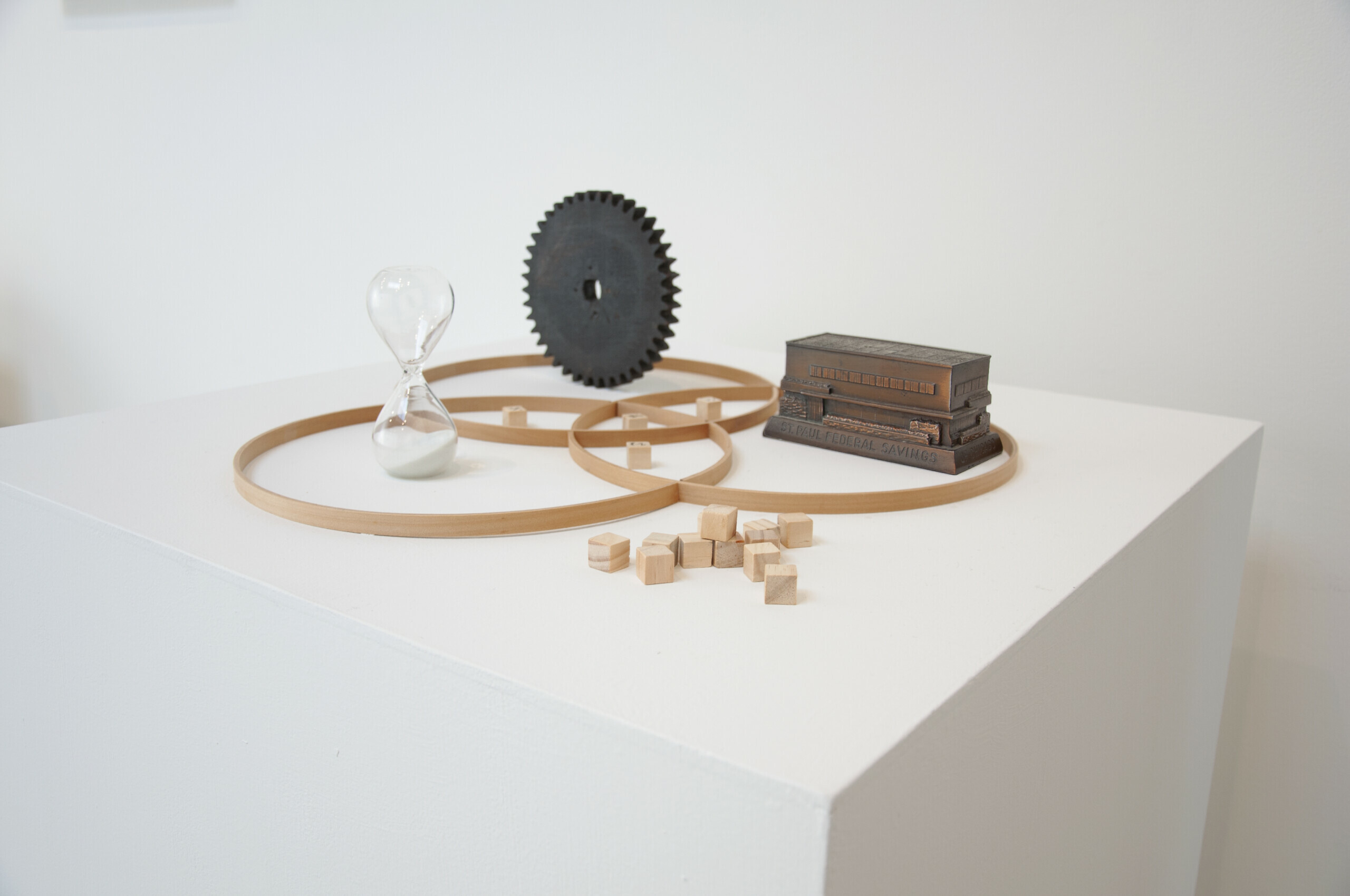 Some items from the collection including a sand timer and small wooden blocks