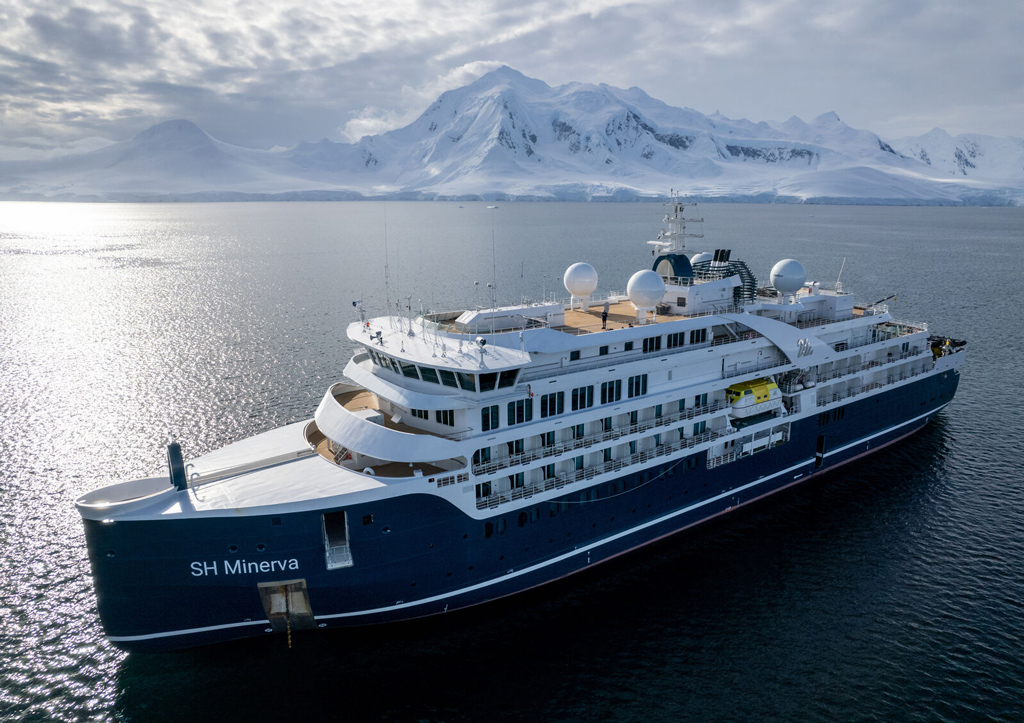 SH Minerva with snowy mountains in the background