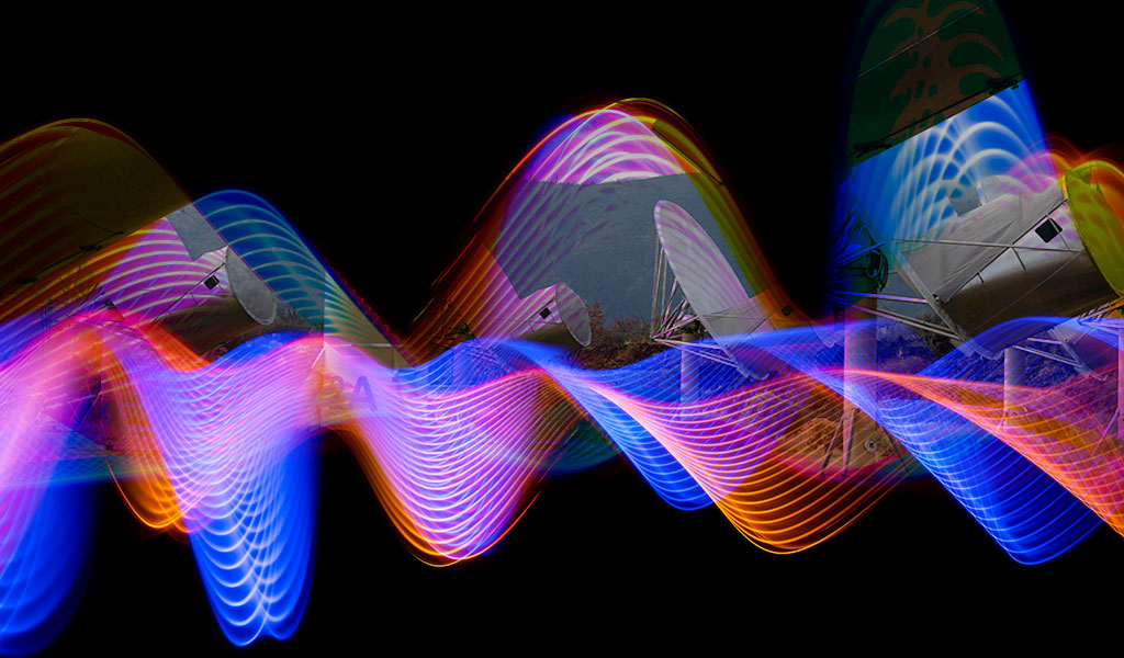 colorful waves with ata in background
