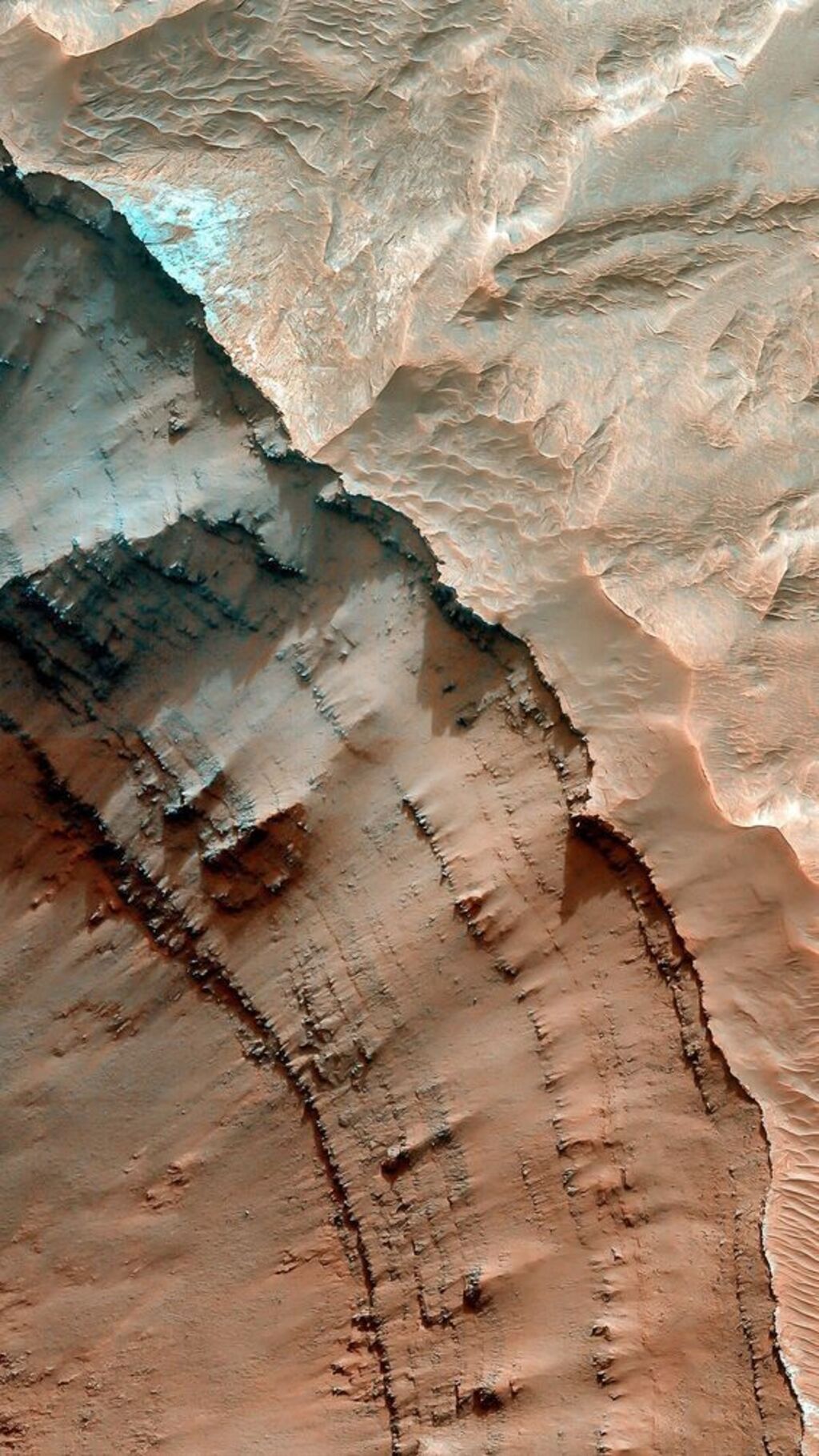 Layered red rocky surface