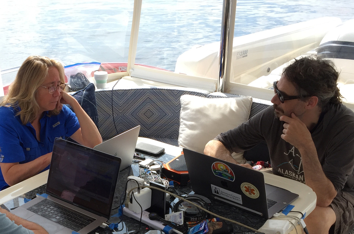Dr. Brenda McCowan and Dr. Fred Sharpe at work onboard the Blue Pearl. Image credit: Jodi Frediani.