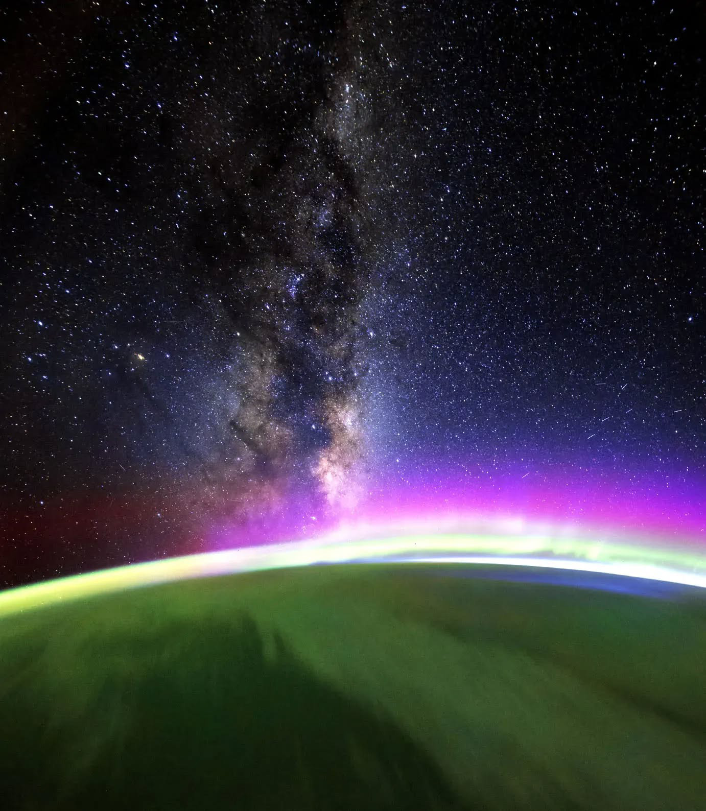 Cosmic Colors Over an Orbital Sunrise