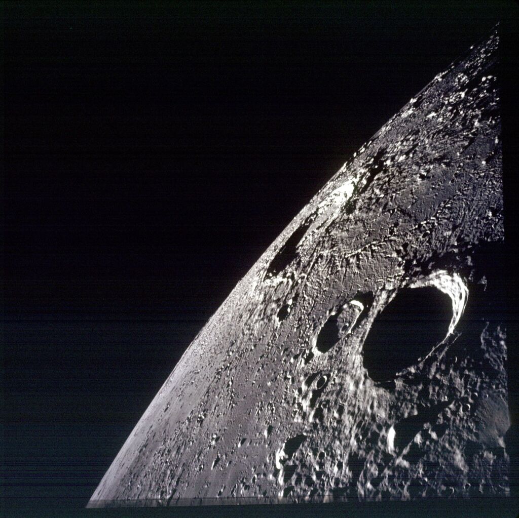 black and white close-up image of the Moon