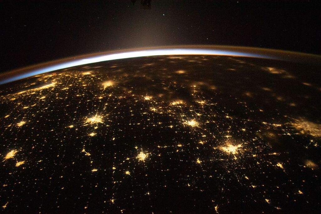 sunlight peeking through the surface of Earth