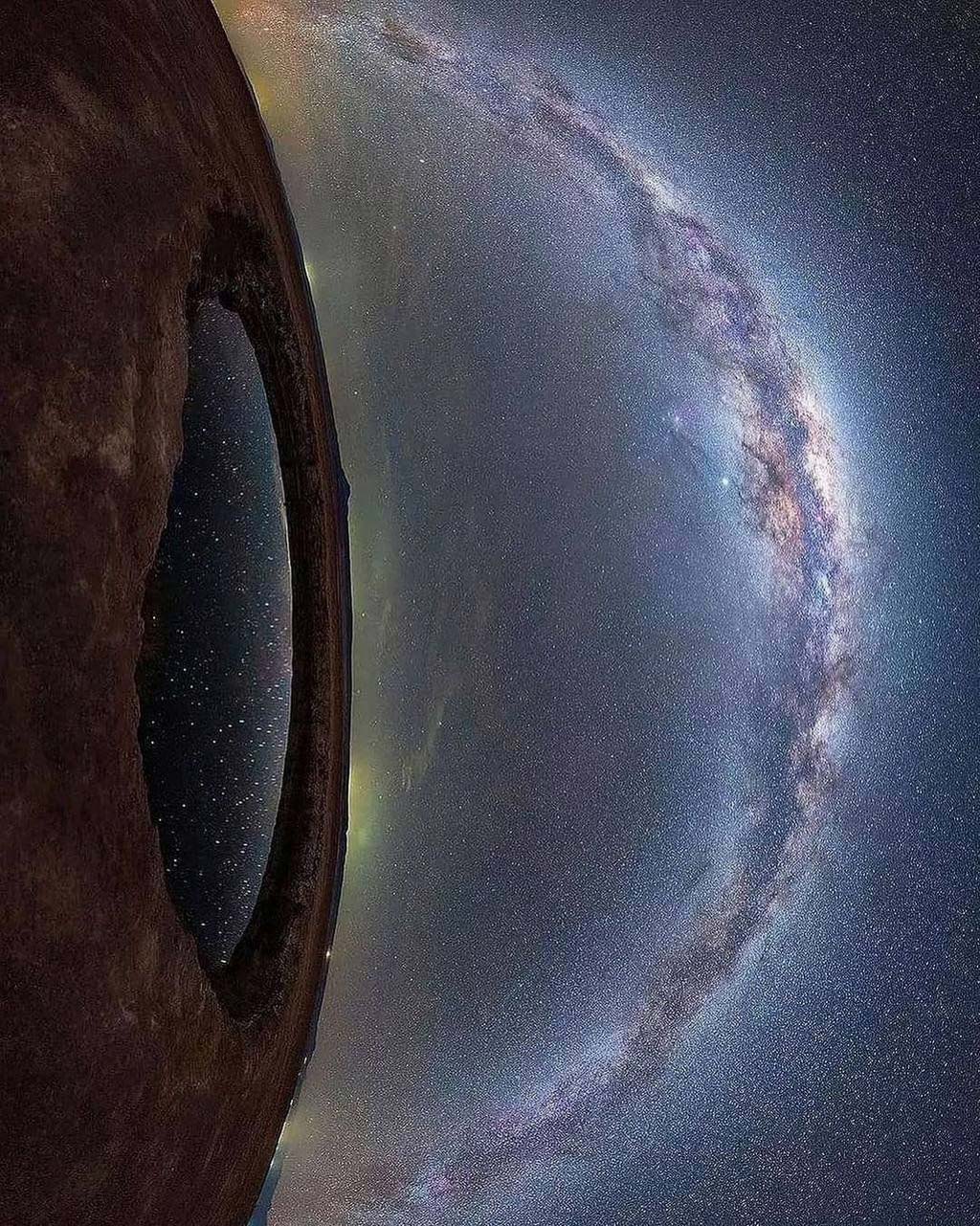Fish lense view of a watering hole and the night starry sky