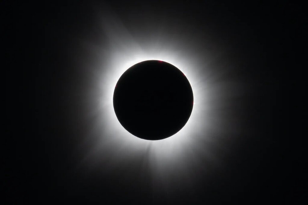Dark circle with a bright white halo