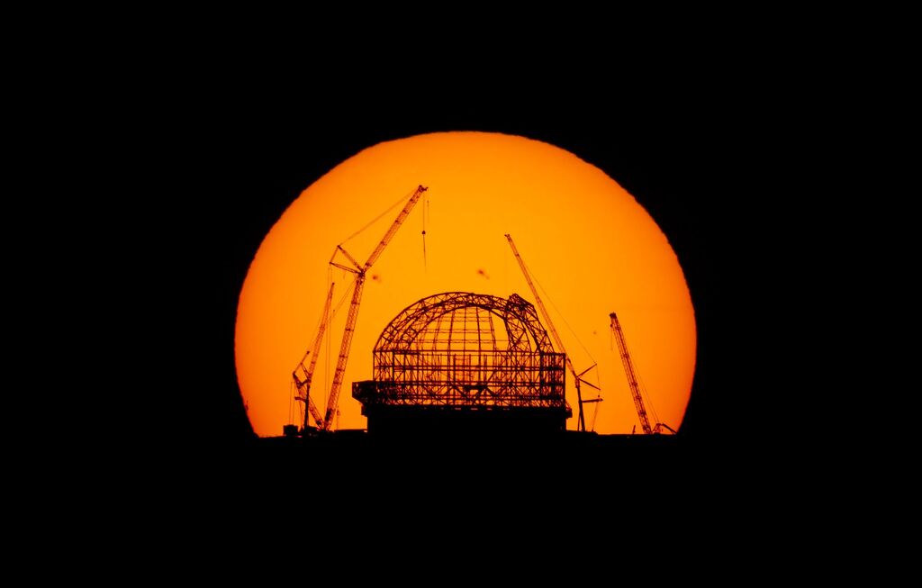 bright orange sun behind ELT