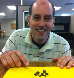 Dr. Peter Jenniskens with the recovered meteorites