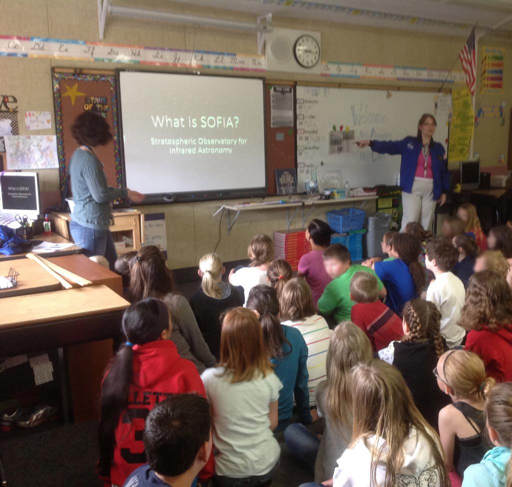 AAA teachers Kim Abegglen and Anna-Melissa Lyons with students