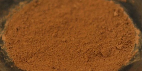 close up image of brown-red dirt.