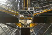 TX-2: MOONSHADOW (2022) handmade mylar solar sail, custom machined aluminum, measuring tapes, Kapton tape, custom mylar tape, custom electronics, sculpted rock made from simulated Martian regolith, various lichen species, Homestead meteorite fragment; approximately 4m x 4m; detail