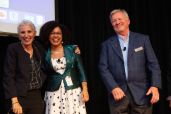 Nathalie Cabrol, Moiya McTier, and Bill Diamond on stage