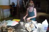 woman working at a table spore workshop